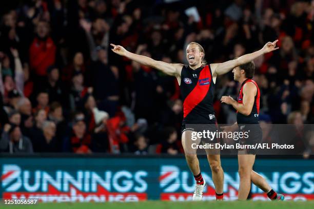 Mason Redman of the Bombers celebrates a goal during the 2023 AFL Round 04 match between the Essendon Bombers and the GWS Giants at Marvel Stadium on...