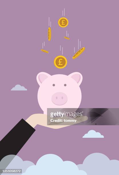 ilustrações de stock, clip art, desenhos animados e ícones de businessman raises piggy bank with a falling a uk pound coin - moeda de uma libra