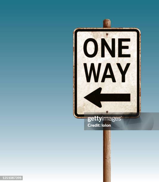grunge one way road sign vector illustration and blue sky - rusted metal letters stock illustrations