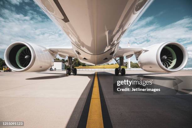 aircraft fuselage - jet engine stock pictures, royalty-free photos & images