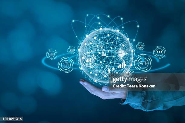 businessman holds a globe that connects a network of information forwarding to the world, quick and easy forwarding information, network connection concept - overdracht business mensen stockfoto's en -beelden