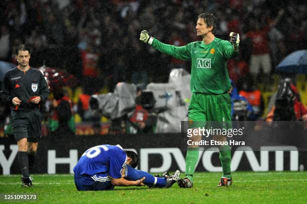 John Terry of Chelsea reacts after missing his penalty while Edwin van der Sar of Manchester United celebrates during the penalty shootout during the...