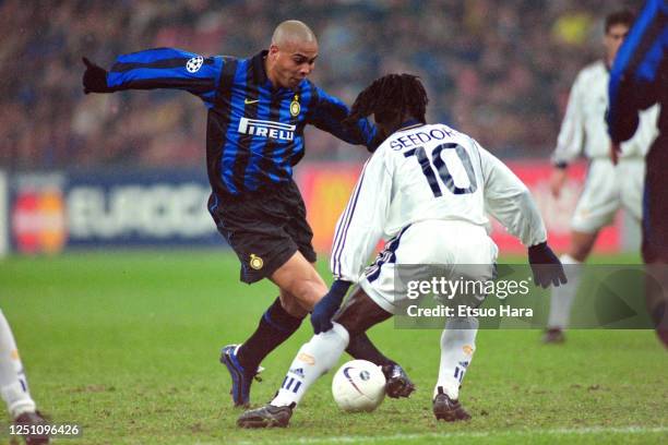 Ronaldo of Inter Milan takes on Clarence Seedolf of Real Madrid during the UEFA Champions League Group C match between Inter Milan and Real Madrid at...