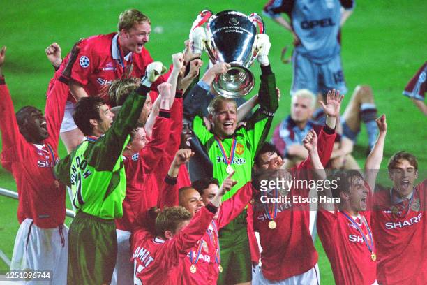 Captain Peter Schmeichel of Manchester United lifts the trophy after the UEFA Champions League final between Manchester United and Bayern Munich at...