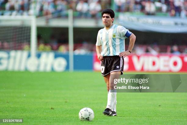 Diego Maradona of Argentina prepares for taking a free kick during the FIFA World Cup Italy Group B match between Argentina and Cameroon at the...