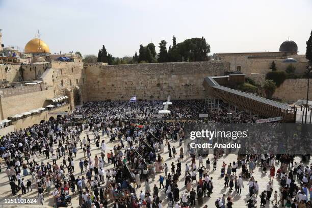 Jewish people pray at a ceremony during the Passover holiday at Western Wall in East Jerusalem, on April 09, 2023.