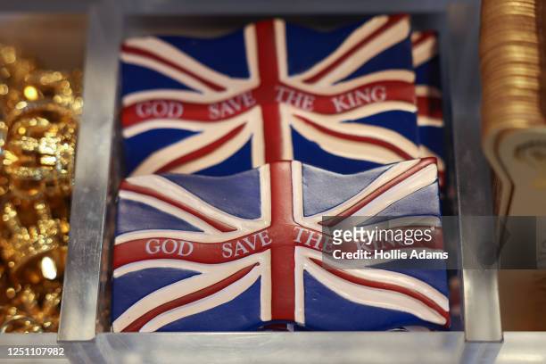 King Charles III merchandise for sale ahead of his Coronation on April 9, 2023 in London, England. The Coronation of King Charles III and The Queen...