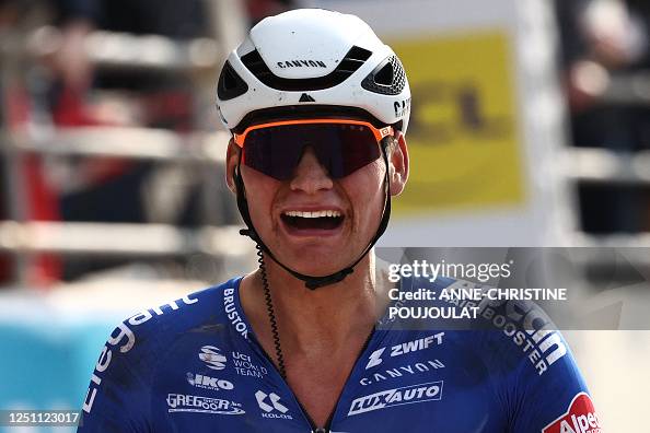 Dutch Rider Alpecin-Deceuninck team's Dutch rider Mathieu Van Der Poel celebrates ...