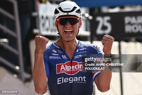 Dutch Rider Alpecin-Deceuninck team's Dutch rider Mathieu Van Der Poel celebrates ...