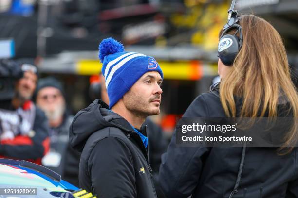 Cup Series driver Kyle Larson talks with Shannon Spake after winning his heat race for the Food City Dirt Race on April 8, 2023 at Bristol Motor...