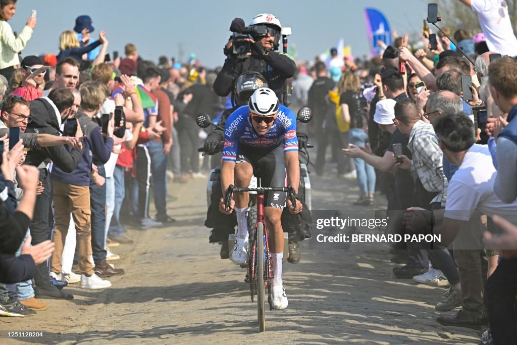 Dutch Rider Alpecin-Deceuninck team's Dutch rider Mathieu Van Der Poel cycles ...