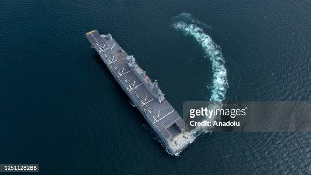 An aerial view of the world's first armed unmanned aerial vehicle ship and Turkiye's largest warship, the Multi-Purpose Amphibious Assault Ship TCG...