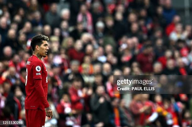 Liverpool's Brazilian striker Roberto Firmino celebrates scoring the team's second goal during the English Premier League football match between...