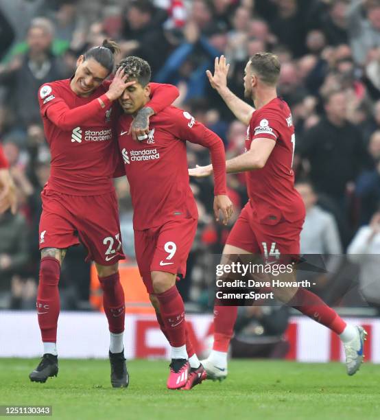 Liverpool's Roberto Firmino is congratulated on scoring his teams second goal during the Premier League match between Liverpool FC and Arsenal FC at...