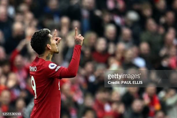 Liverpool's Brazilian striker Roberto Firmino celebrates scoring the team's second goal during the English Premier League football match between...