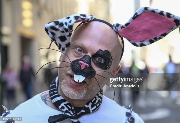 People participate with colorful costumes and hats at the annual Easter Parade in New York City, United States on April 09, 2023.