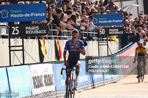 Dutch Rider Alpecin-Deceuninck team's Dutch rider Mathieu Van Der Poel celebrates ...
