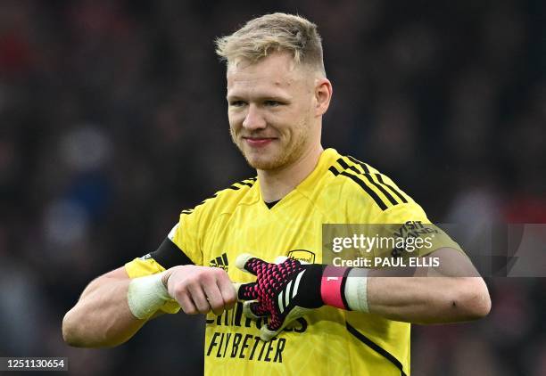 Arsenal's English goalkeeper Aaron Ramsdale reacts after the English Premier League football match between Liverpool and Arsenal at Anfield in...