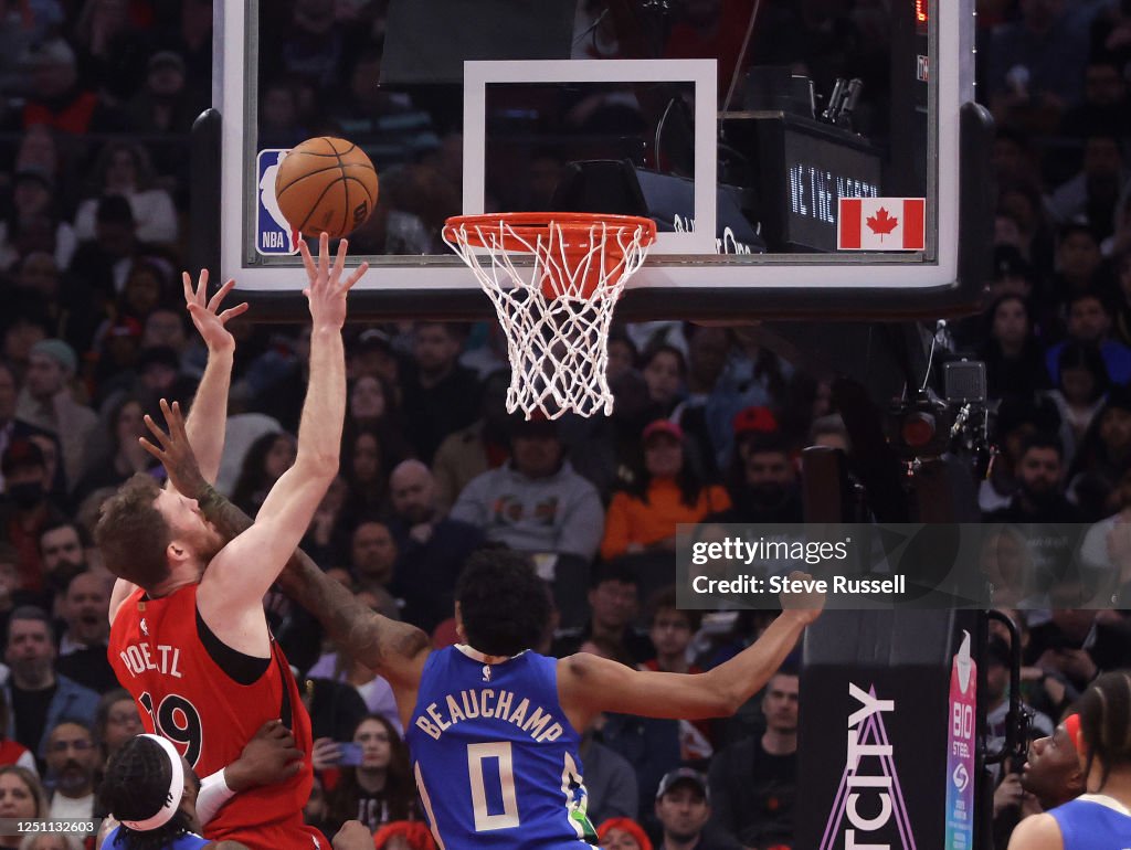 Toronto Raptors Centre TORONTO, ON- APRIL 9 - Toronto Raptors center Jakob Poeltl puts up a ...