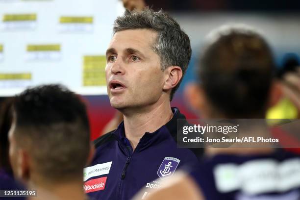 Dockers coach Justin Longmuir talks to his team during the round 4 AFL match between the Fremantle Dockers and Port Adelaide Power at Metricon...