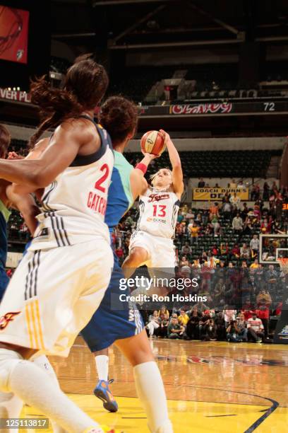 Erin Phillips of the Indiana Fever hits a shot with one and half seconds left to defeat the New York Liberty in Game One of the Eastern Conference...