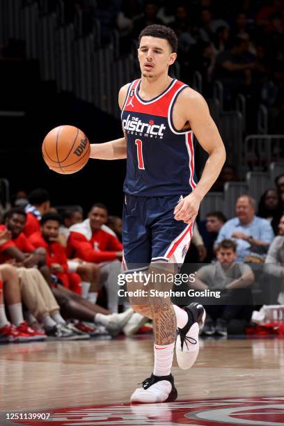 Johnny Davis of the Washington Wizards handles the ball during the game against the Houston Rockets on April 9, 2023 at Capital One Arena in...