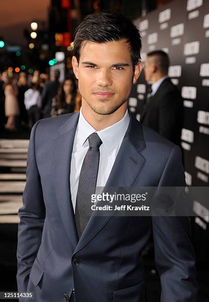 Actor Taylor Lautner arrives at the Los Angeles premiere of "Abduction" at Grauman's Chinese Theatre on September 15, 2011 in Hollywood, California.