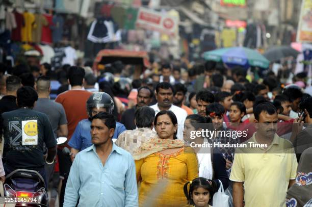 People are seen without face masks in weekly market during a hot summer day at Sadar Bazar near Sohna chowk, on April 9, 2023 in Gurugram, India.