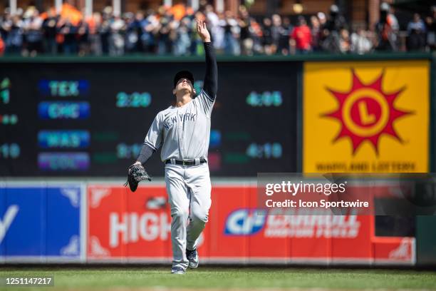 New York Yankees first baseman Anthony Rizzo uses his hand to block the sun on a pop up during the New York Yankees versus Baltimore Orioles MLB game...