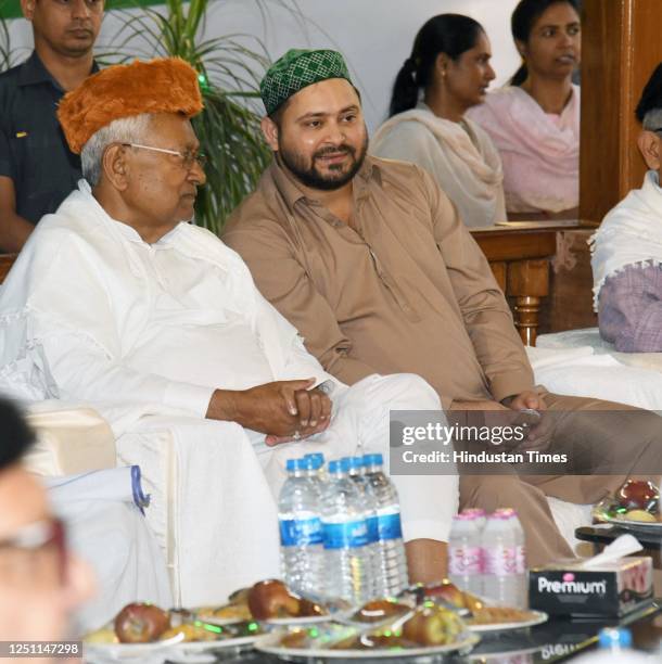 Bihar Chief Minister Nitish Kumar with Deputy Chief Minister Tejashwi Yadav and others during an Iftar party at the residence of former Bihar Chief...