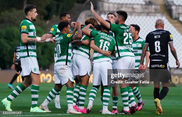 Francisco Trincao of Sporting CP celebrates with teammates after scoring a goal during the Liga Bwin match between Casa Pia AC and Sporting CP at...