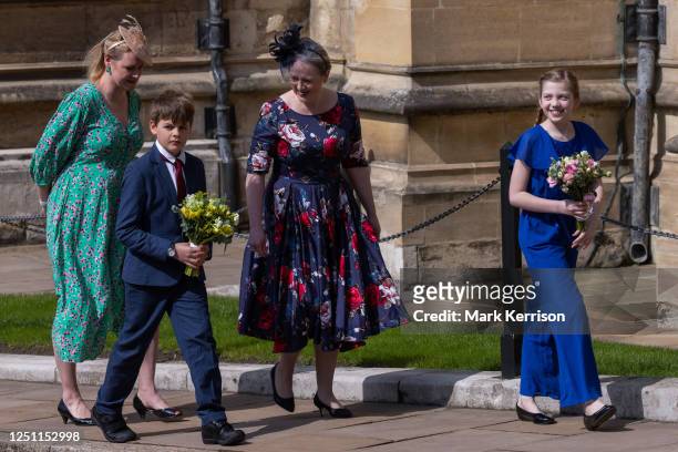 Samuel and Harriet prepare to give Easter posies to Catherine, Princess of Wales, and Camilla, the Queen Consort, following the Easter Sunday church...