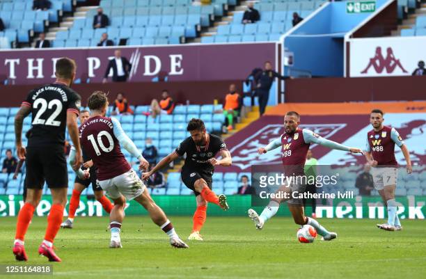 Olivier Giroud of Chelsea scores his teams second goal during the Premier League match between Aston Villa and Chelsea FC at Villa Park on June 21,...