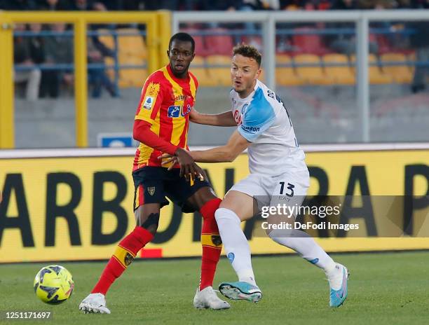 Amir Rrahmani of SSC Napoli, Samuel Umtiti of US Lecce battle for the ball during the Serie A match between US Lecce and SSC Napoli at Stadio Via del...