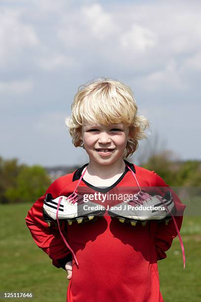 portait of a boy - soccer boot stock pictures, royalty-free photos & images