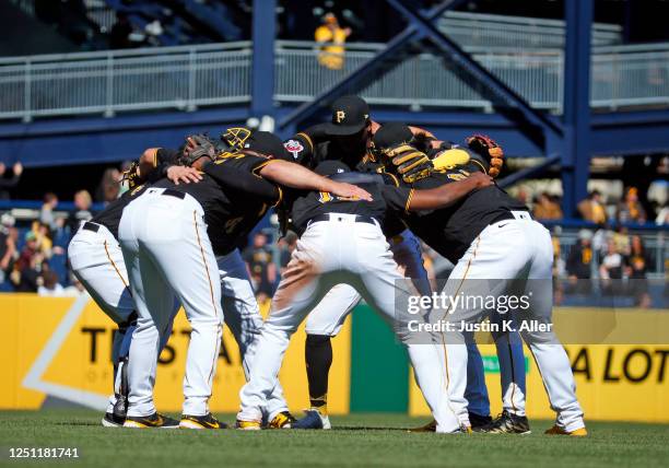 The Pittsburgh Pirates celebrate after defeating the Chicago White Sox 1-0 during inter-league play at PNC Park on April 9, 2023 in Pittsburgh,...