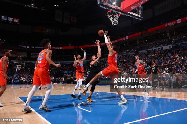 Kenneth Lofton Jr. #6 of the Memphis Grizzlies shoots the ball during the game against the Oklahoma City Thunder on April 9, 2023 at Paycom Arena in...