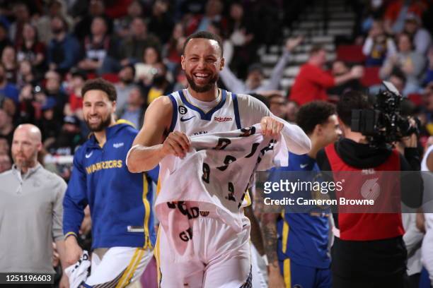 Stephen Curry of the Golden State Warriors smiles during the game against the Portland Trail Blazers on April 9, 2023 at the Moda Center Arena in...