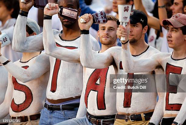 Mississippi State fans ring cowbells as the Bulldogs take the field to play aginst LSU on September 15, 2011 at Davis Wade stadium in Starkville,...