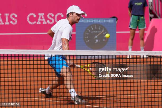 Miomir Kecmanovic of Serbia plays against Casper Ruud of Norway during the Final of the Millennium Estoril Open tournament at CTE- Clube de Ténis do...