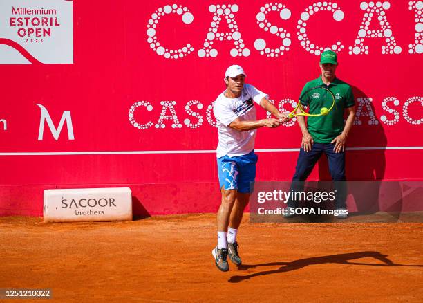 Miomir Kecmanovic of Serbia plays against Casper Ruud of Norway during the Final of the Millennium Estoril Open tournament at CTE- Clube de Ténis do...