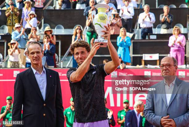 Casper Ruud of Norway holds a trophy after the Final of the Millennium Estoril Open tournament against Miomir Kecmanovic of Serbia at CTE- Clube de...