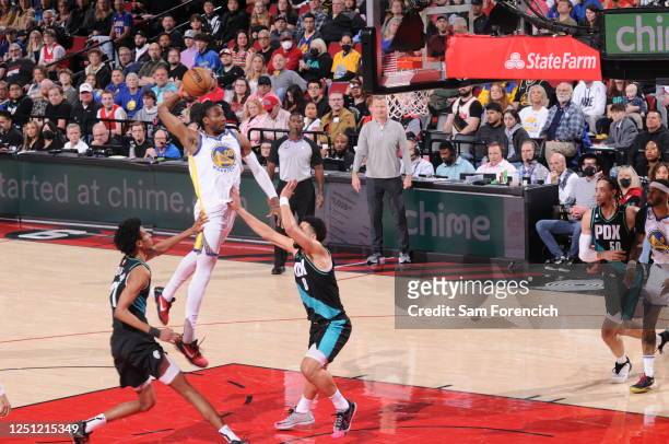 Jonathan Kuminga of the Golden State Warriors drives to the basket during the game against the Portland Trail Blazers on April 9, 2023 at the Moda...