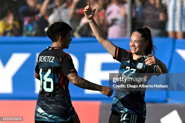 Estefania Banini of Argentina celebrates with teammate Lorena Benítez after scoring the team´s third goal during an international friendly match...