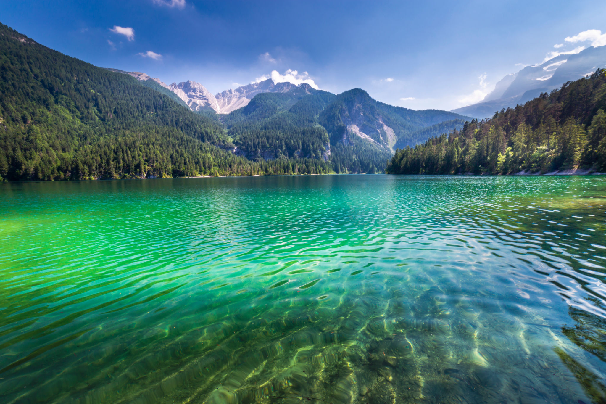 Ethereal translucent Lake Tovel landscape – Trentino, Dolomites – Italy Ethereal translucent Lake Tovel landscape – Trentino, Dolomites – Italy