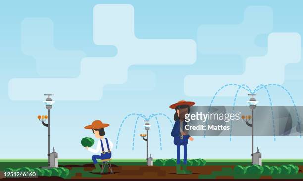 frau und mann bauern pflanzen und mit modernen bewässerungsrobotern, um den wasserverbrauch zu reduzieren - diversity people engineering stock-grafiken, -clipart, -cartoons und -symbole