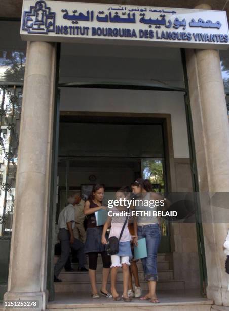 Students stand in front of Bourguiba Institute of Modern Languages 02 August 2007 in Tunis. Some 1,200 foreign students will attend an intensif...