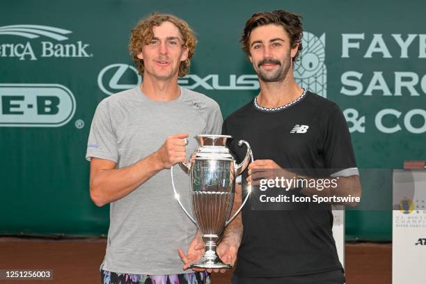 Max Purcell and Jordan Thompson hold the trophy for winning the the doubles final at the US Clay Court Championship at River Oaks Country Club on...