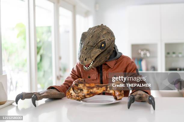 lunch is serve for dinosaur teen - tyrannosaurus rex stock pictures, royalty-free photos & images
