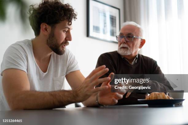 serious discussion - family serious stock pictures, royalty-free photos & images